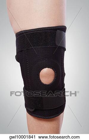Knee brace on a person's knee View Large Photo Image Stock Image - Knee brace on a person's knee. Fotosearch