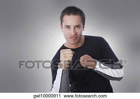 Man in boxing stance View Large Photo Image Stock Image - Man in boxing stance. Fotosearch