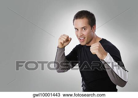 Man in boxing stance View Large Photo Image Stock Image - Man in boxing stance. Fotosearch
