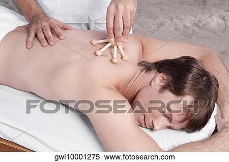 Man receiving acupressure treatment View Large Photo Image Stock Photography - Man receiving acupressure treatment. Fotosearch