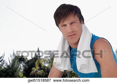 Man relaxing after exercise View Large Photo Image Stock Photo - Man relaxing after exercise. Fotosearch