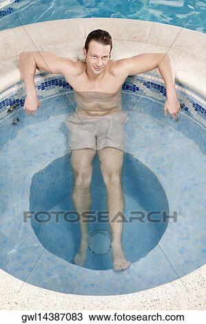 Man relaxing in a hot tub View Large Photo Image Stock Image - Man relaxing in a hot tub. Fotosearch