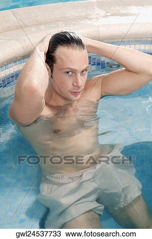 Man relaxing in a hot tub View Large Photo Image Stock Image - Man relaxing in a hot tub. Fotosearch