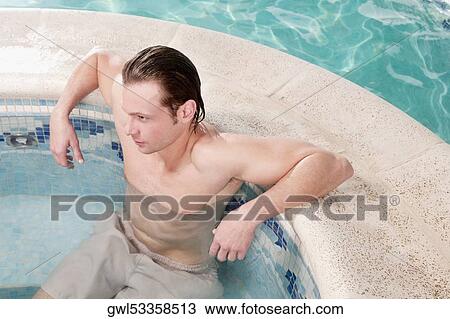 Man relaxing in a hot tub View Large Photo Image Stock Image - Man relaxing in a hot tub. Fotosearch