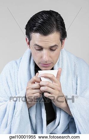 Man taking hot drink View Large Photo Image Stock Photography - Man taking hot drink. Fotosearch