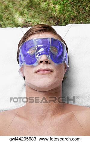 Man wearing eye mask View Large Photo Image Stock Image - Man wearing eye mask. Fotosearch