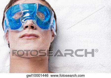 Man wearing eye mask View Large Photo Image Stock Photograph - Man wearing eye mask. Fotosearch