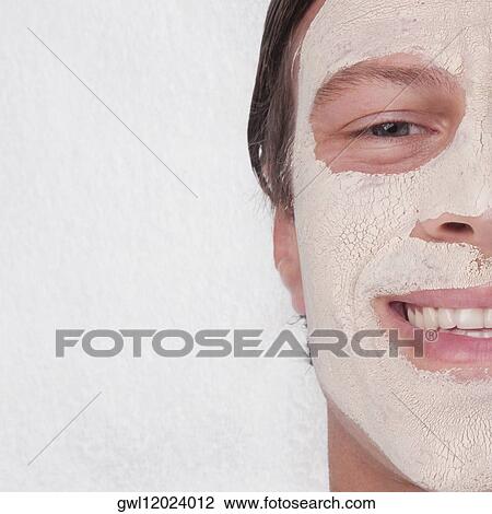 Man with face pack on his face View Large Photo Image Stock Image - Man with face pack on his face. Fotosearch