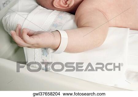 Newborn baby in a hospital View Large Photo Image Picture - Newborn baby in a hospital. Fotosearch