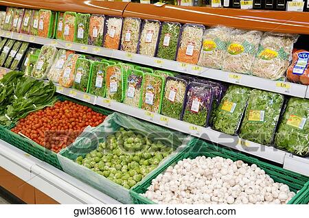 Packed food and vegetables in a supermarket View Large Photo Image Stock Photograph - Packed food and vegetables in a supermarket. Fotosearch