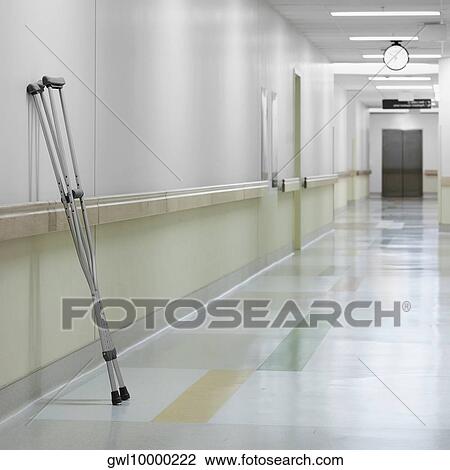 Stock Image - Pair of crutch in a hospital. Fotosearch