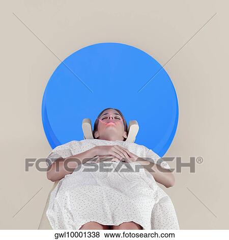 Patient going through an MRI scan View Large Photo Image Stock Photo - Patient going through an MRI scan. Fotosearch