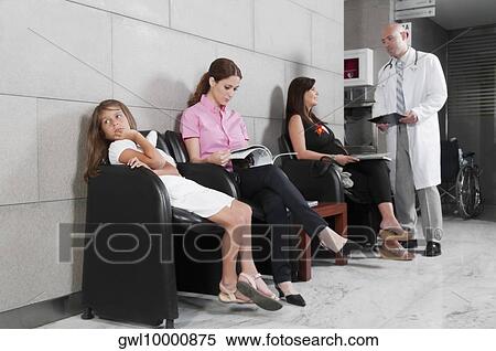 Patients and a doctor in a waiting room View Large Photo Image Stock Photography - Patients and a doctor in a waiting room. Fotosearch
