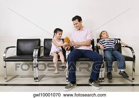 Patients waiting in a hospital View Large Photo Image Stock Image - Patients waiting in a hospital. Fotosearch