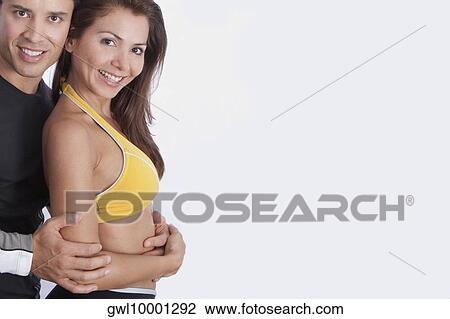 Portrait of a couple smiling View Large Photo Image Stock Image - Portrait of a couple smiling. Fotosearch