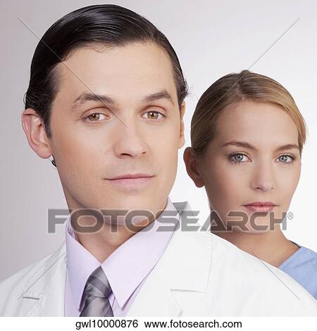 Portrait of a doctor and a nurse View Large Photo Image Stock Photograph - Portrait of a doctor and a nurse. Fotosearch