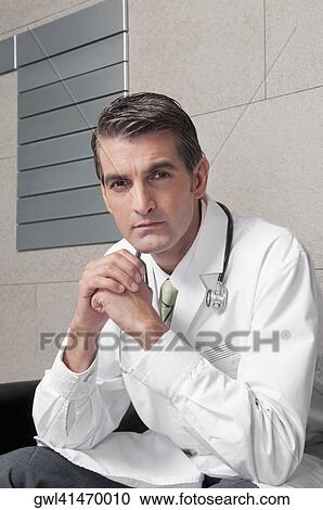 Portrait of a doctor View Large Photo Image Stock Image - Portrait of a doctor. Fotosearch