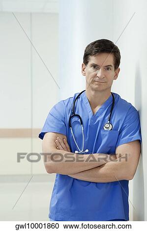Portrait of a doctor thinking View Large Photo Image Stock Image - Portrait of a doctor thinking. Fotosearch
