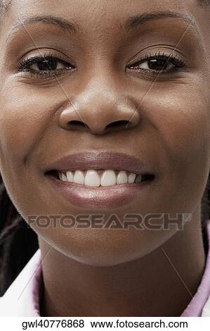 Portrait of a female doctor smiling View Large Photo Image Stock Photo - Portrait of a female doctor smiling. Fotosearch