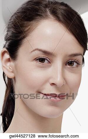Portrait of a female doctor smiling View Large Photo Image Stock Photo - Portrait of a female doctor smiling. Fotosearch
