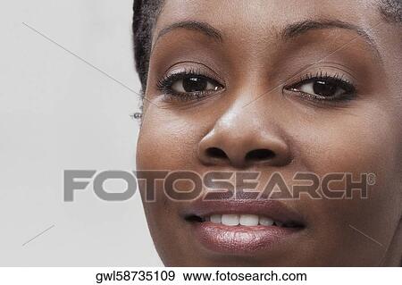 Portrait of a female doctor smiling View Large Photo Image Stock Photo - Portrait of a female doctor smiling. Fotosearch