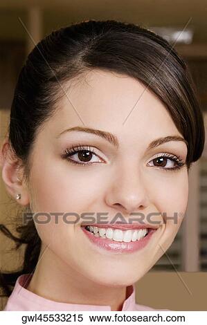Portrait of a female doctor smiling View Large Photo Image Stock Photography - Portrait of a female doctor smiling. Fotosearch