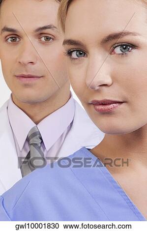 Portrait of a female nurse and a doctor View Large Photo Image Stock Image - Portrait of a female nurse and a doctor. Fotosearch