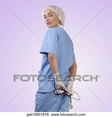 Portrait of a female nurse with a stethoscope View Large Photo Image Stock Photograph - Portrait of a female nurse with a stethoscope. Fotosearch