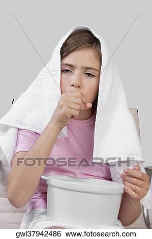 Stock Photograph - Portrait of a girl coughing. Fotosearch