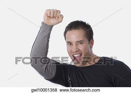 Portrait of a man clenching fist View Large Photo Image Stock Photo - Portrait of a man clenching fist. Fotosearch