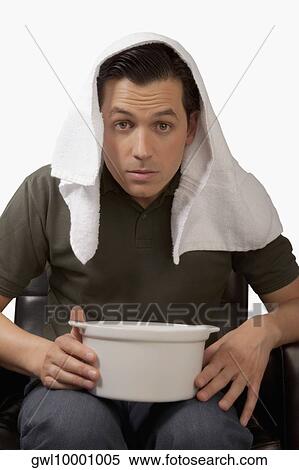 Portrait of a man inhaling steam View Large Photo Image Stock Photography - Portrait of a man inhaling steam. Fotosearch