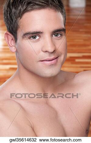 Portrait of a man smirking View Large Photo Image Stock Image - Portrait of a man smirking. Fotosearch