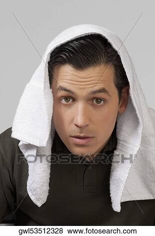 Portrait of a man suffering from cold View Large Photo Image Stock Photo - Portrait of a man suffering from cold. Fotosearch
