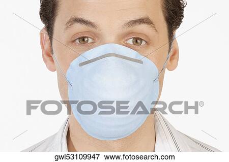 Portrait of a man wearing a flu mask View Large Photo Image Stock Photo - Portrait of a man wearing a flu mask. Fotosearch
