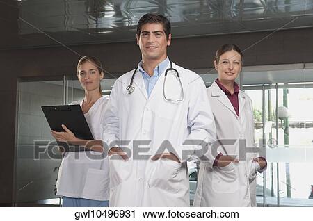 Portrait of doctors and a nurse View Large Photo Image Stock Image - Portrait of doctors and a nurse. Fotosearch