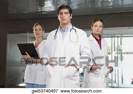 Portrait of doctors and a nurse View Large Photo Image Stock Photo - Portrait of doctors and a nurse. Fotosearch