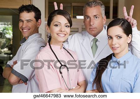 Portrait of four doctors View Large Photo Image Stock Image - Portrait of four doctors. Fotosearch