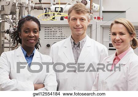 Portrait of three doctors in a laboratory View Large Photo Image Picture - Portrait of three doctors in a laboratory. Fotosearch