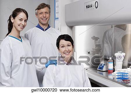 Portrait of three doctors in a laboratory View Large Photo Image Stock Image - Portrait of three doctors in a laboratory. Fotosearch