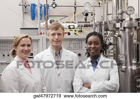 Portrait of three doctors in a laboratory View Large Photo Image Stock Photo - Portrait of three doctors in a laboratory. Fotosearch