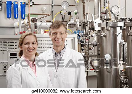 Stock Image - Portrait of two doctors in a laboratory. Fotosearch