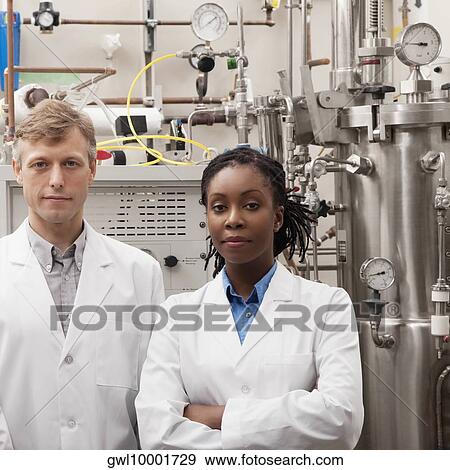 Portrait of two doctors in a laboratory View Large Photo Image Stock Photo - Portrait of two doctors in a laboratory. Fotosearch