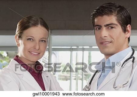 Portrait of two doctors View Large Photo Image Stock Image - Portrait of two doctors. Fotosearch