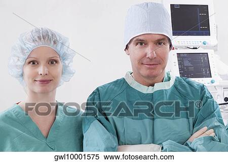 Portrait of two surgeons smiling View Large Photo Image Stock Photography - Portrait of two surgeons smiling. Fotosearch