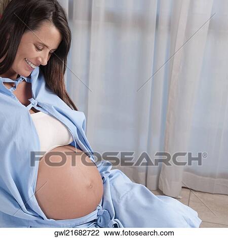 Pregnant woman in a hospital View Large Photo Image Stock Image - Pregnant woman in a hospital. Fotosearch