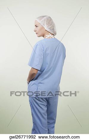 Rear view of a female surgeon View Large Photo Image Stock Image - Rear view of a female surgeon. Fotosearch