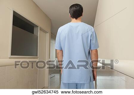 Rear view of a surgeon View Large Photo Image Stock Photography - Rear view of a surgeon. Fotosearch