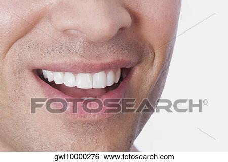 Smiling face of a man View Large Photo Image Stock Photograph - Smiling face of a man. Fotosearch
