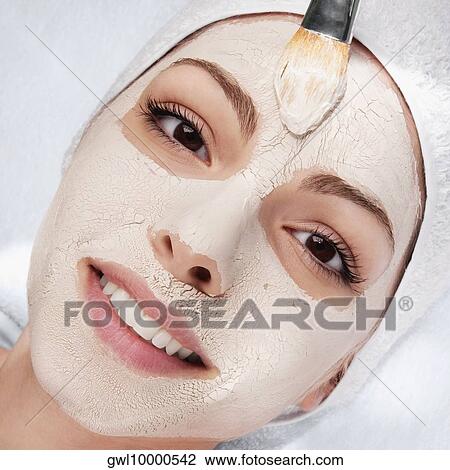 Woman applying face pack View Large Photo Image Stock Image - Woman applying face pack. Fotosearch