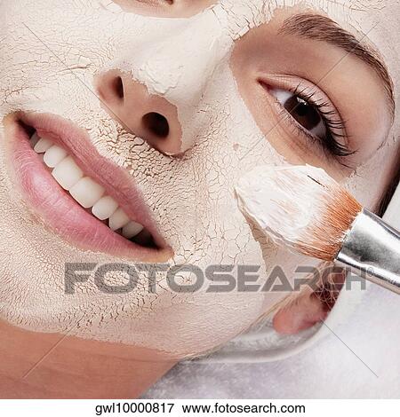 Woman applying face pack View Large Photo Image Stock Photo - Woman applying face pack. Fotosearch